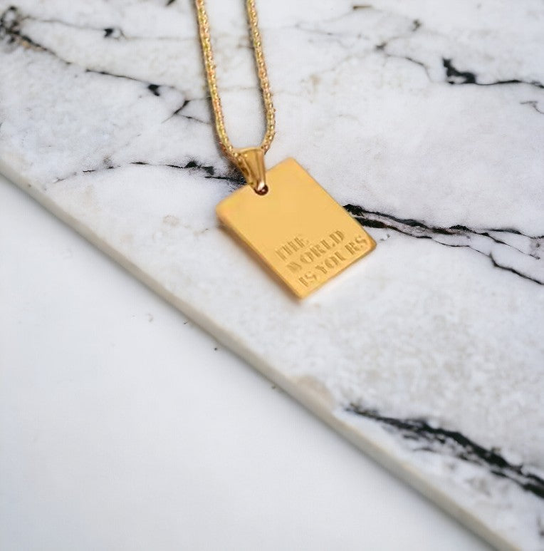 THE WORLD IS YOURS Gold Necklace